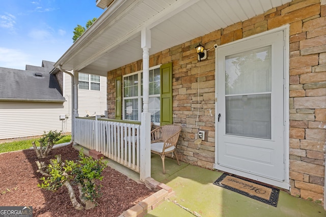 1450 Steam Engine Way NE, Conyers, GA 30013 - property entrance featuring covered porch and stone siding