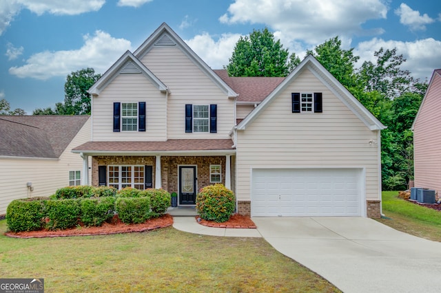 2725 Sedgeview Way, Buford, GA 30519 - traditional-style house featuring brick siding, central AC unit, concrete driveway, a shingled roof, and a front lawn