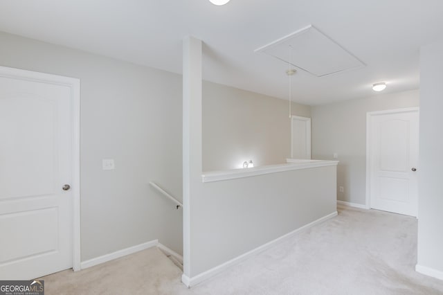 2725 Sedgeview Way, Buford, GA 30519 - hall with attic access, an upstairs landing, light carpet, and baseboards