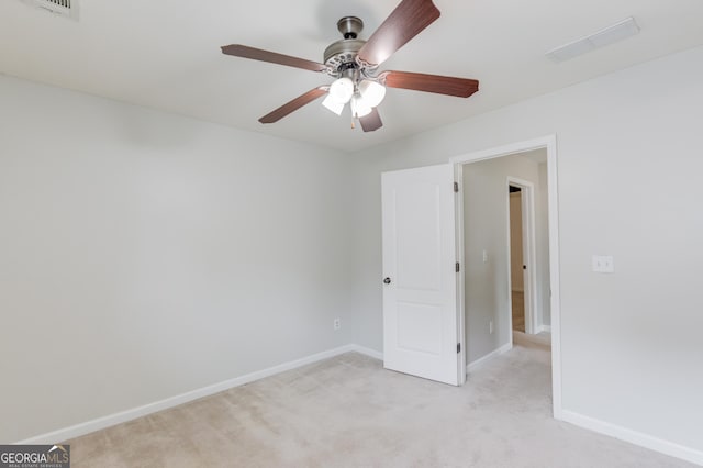2725 Sedgeview Way, Buford, GA 30519 - spare room featuring a ceiling fan, baseboards, and light carpet
