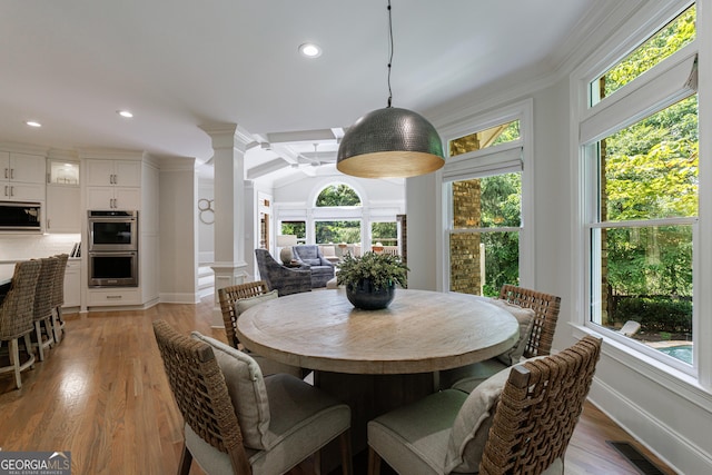 2101 Hunters Green Dr, Lawrenceville, GA 30043 - dining space featuring decorative columns, plenty of natural light, recessed lighting, light wood-style flooring, and ornamental molding