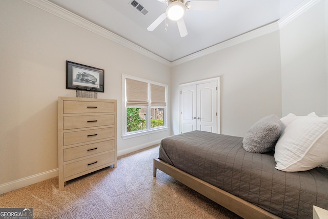 2101 Hunters Green Dr, Lawrenceville, GA 30043 - bedroom featuring baseboards, light colored carpet, crown molding, ceiling fan, and a closet