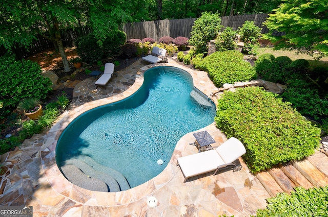 2101 Hunters Green Dr, Lawrenceville, GA 30043 - view of swimming pool featuring a fenced backyard and a patio area