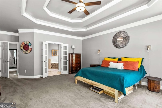 4251 Lantern Hill Dr, Dacula, GA 30019 - bedroom with a raised ceiling, french doors, carpet floors, crown molding, and baseboards