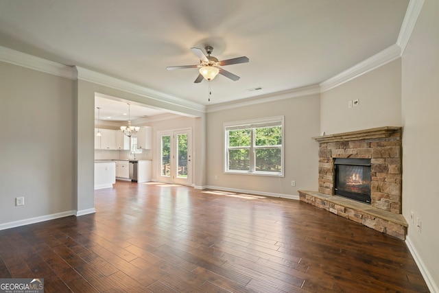 4650 Pleasant Woods Dr, Cumming, GA 30028 - unfurnished living room featuring a ceiling fan, a stone fireplace, baseboards, a chandelier, and dark wood-type flooring