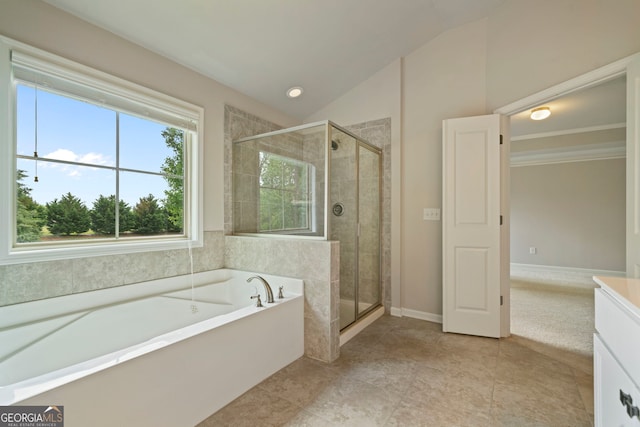 4650 Pleasant Woods Dr, Cumming, GA 30028 - full bathroom with a bath, a stall shower, vaulted ceiling, and vanity