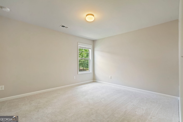 4650 Pleasant Woods Dr, Cumming, GA 30028 - carpeted empty room with a smoke detector and baseboards