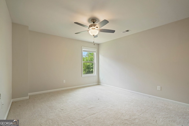 4650 Pleasant Woods Dr, Cumming, GA 30028 - carpeted empty room with baseboards and a ceiling fan