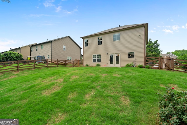 4650 Pleasant Woods Dr, Cumming, GA 30028 - rear view of house with french doors and a gate