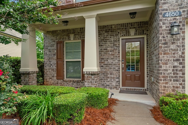4650 Pleasant Woods Dr, Cumming, GA 30028 - property entrance featuring brick siding