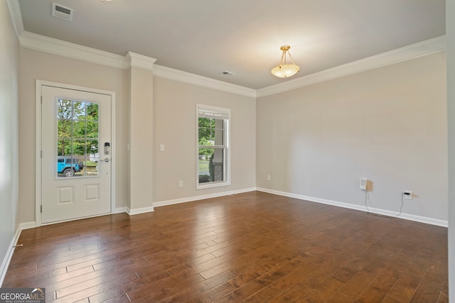 4650 Pleasant Woods Dr, Cumming, GA 30028 - empty room with healthy amount of natural light, ornamental molding, dark wood-style floors, and baseboards