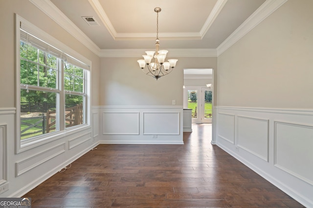 4650 Pleasant Woods Dr, Cumming, GA 30028 - unfurnished dining area with a tray ceiling, plenty of natural light, a chandelier, a decorative wall, and dark wood-style floors