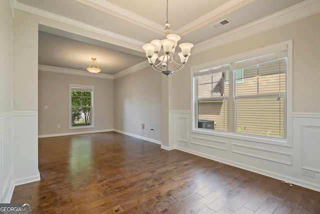 4650 Pleasant Woods Dr, Cumming, GA 30028 - empty room featuring a chandelier, dark wood finished floors, wainscoting, and crown molding