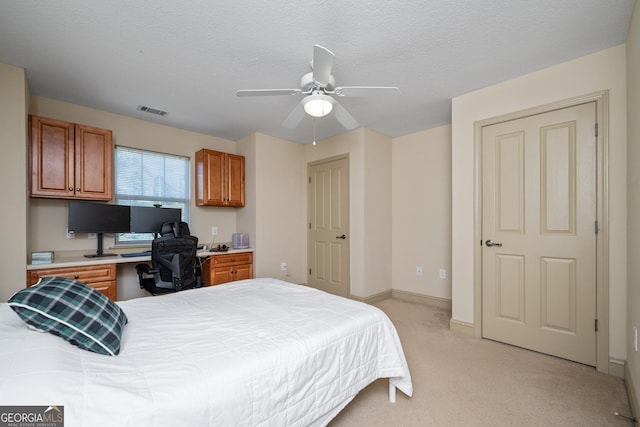1523 Gadwall Way, Seneca, SC 29678 - bedroom featuring a desk, light carpet, baseboards, a ceiling fan, and a textured ceiling