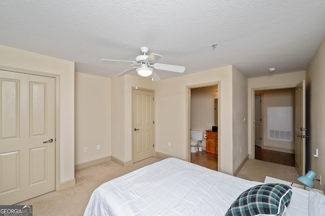 1523 Gadwall Way, Seneca, SC 29678 - bedroom with light carpet, baseboards, a ceiling fan, and a textured ceiling