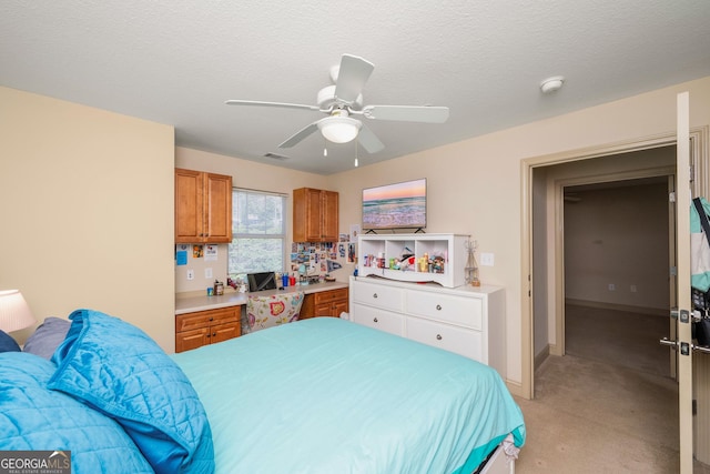 1523 Gadwall Way, Seneca, SC 29678 - bedroom with light carpet, a ceiling fan, a textured ceiling, and baseboards