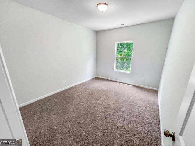 5229 Tye Trl, Fairburn, GA 30213 - carpeted spare room featuring baseboards