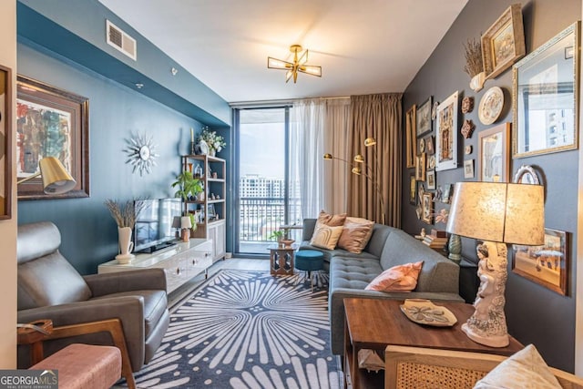 3040 Peachtree Rd NW Unit 1013, Atlanta, GA 30305 - living room with a wall of windows