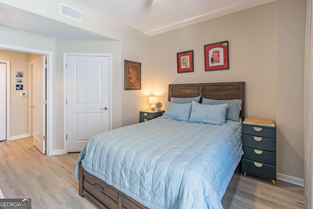 3040 Peachtree Rd NW Unit 1013, Atlanta, GA 30305 - bedroom with light wood finished floors and baseboards