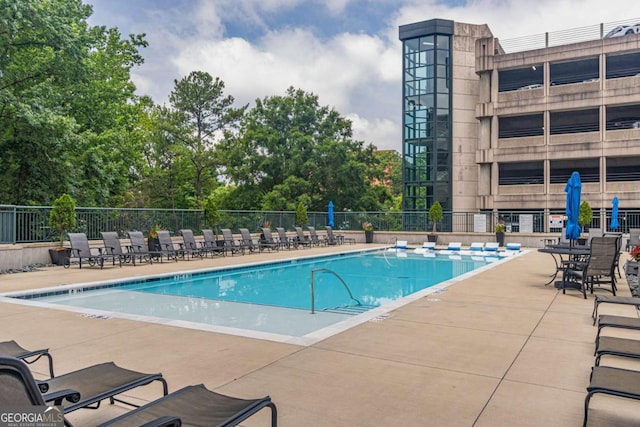 3040 Peachtree Rd NW Unit 1013, Atlanta, GA 30305 - community pool featuring a patio area