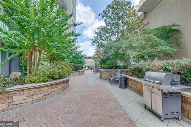 3040 Peachtree Rd NW Unit 1013, Atlanta, GA 30305 - view of patio / terrace featuring grilling area