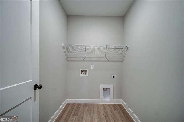 349 Creek Wood Park Dr, Ball Ground, GA 30107 - washroom with hookup for an electric dryer, wood finished floors, and washer hookup