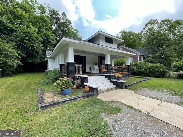1103 E 2nd Ave SE, Rome, GA 30161 - view of front of house with a porch and a front yard
