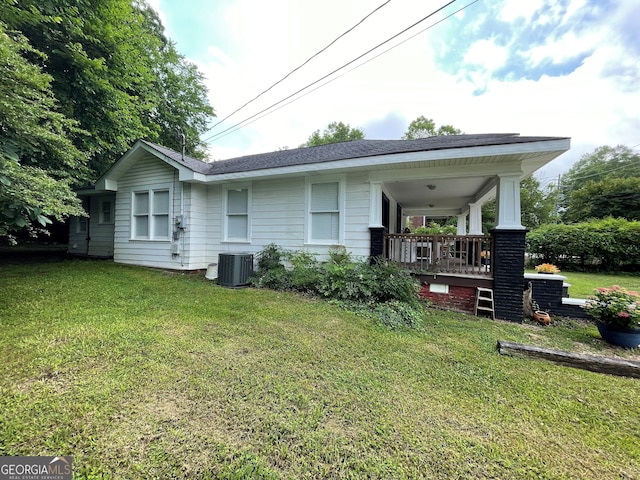 1103 E 2nd Ave SE, Rome, GA 30161 - rear view of house with a lawn, covered porch, and cooling unit