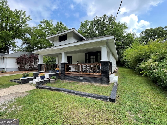1103 E 2nd Ave SE, Rome, GA 30161 - view of front of house featuring covered porch and a front lawn
