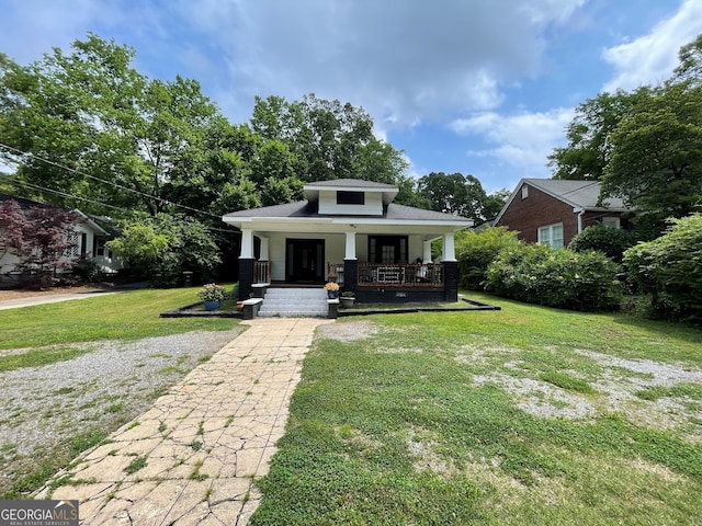 1103 E 2nd Ave SE, Rome, GA 30161 - view of front of house with covered porch and a front yard