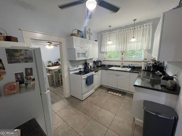 1103 E 2nd Ave SE, Rome, GA 30161 - kitchen with white appliances, ceiling fan, a sink, and dark countertops