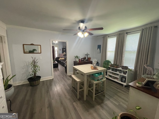 1103 E 2nd Ave SE, Rome, GA 30161 - dining space with dark wood-type flooring, a ceiling fan, crown molding, and baseboards