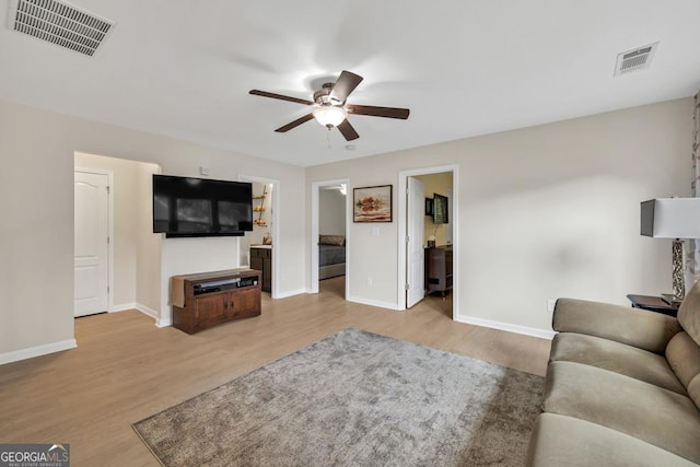3982 Brockenhurst Dr, Buford, GA 30519 - living area with ceiling fan, wood finished floors, and baseboards
