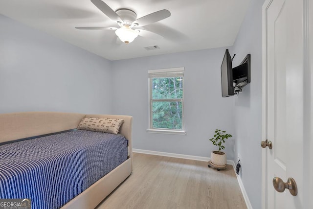 3982 Brockenhurst Dr, Buford, GA 30519 - bedroom featuring wood finished floors, baseboards, and a ceiling fan