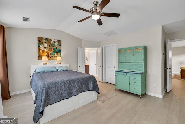 3982 Brockenhurst Dr, Buford, GA 30519 - bedroom with light wood-style flooring, lofted ceiling, baseboards, a ceiling fan, and ensuite bathroom