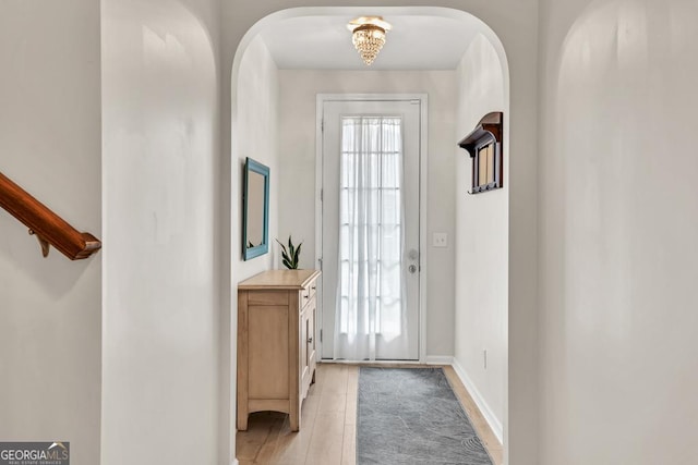 3982 Brockenhurst Dr, Buford, GA 30519 - foyer entrance with arched walkways and baseboards