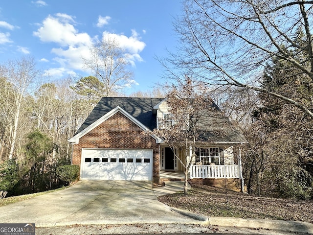 119 E Surry Ct, Athens, GA 30606 - traditional-style house with brick siding, covered porch, driveway, an attached garage, and roof with shingles