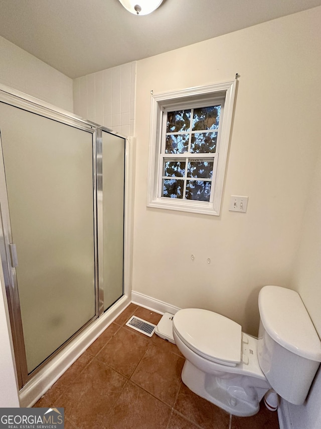 119 E Surry Ct, Athens, GA 30606 - bathroom with tile patterned flooring and a stall shower