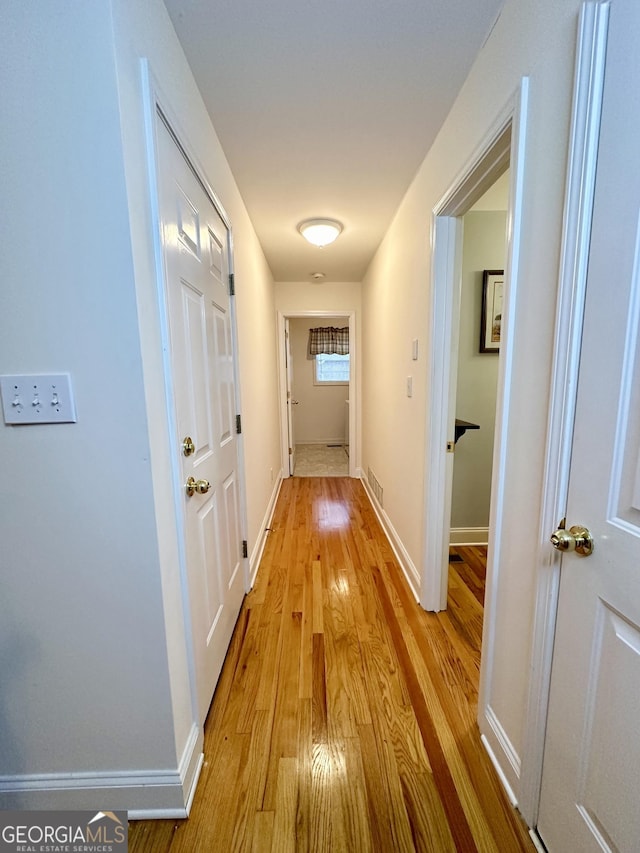 119 E Surry Ct, Athens, GA 30606 - hall with light wood-style floors and baseboards