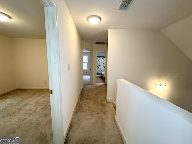 119 E Surry Ct, Athens, GA 30606 - hallway featuring an upstairs landing, light carpet, and baseboards
