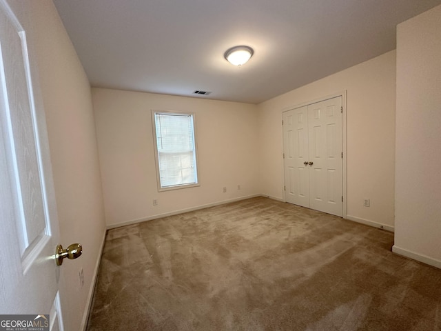119 E Surry Ct, Athens, GA 30606 - unfurnished bedroom featuring carpet floors and baseboards