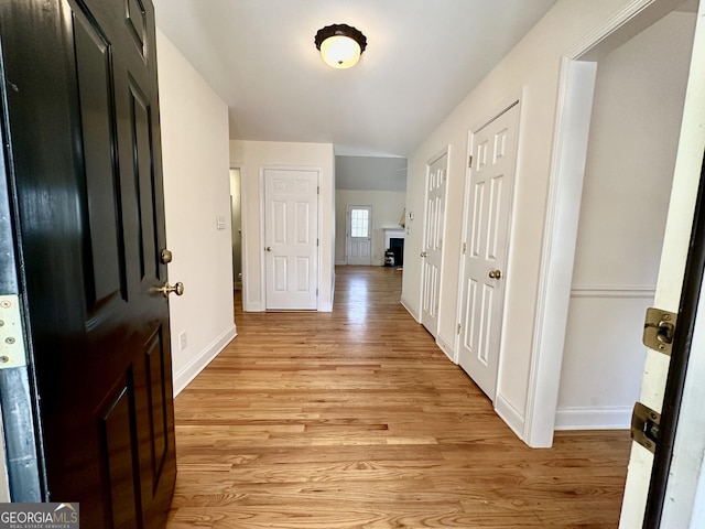 119 E Surry Ct, Athens, GA 30606 - hall with light wood-style floors and baseboards