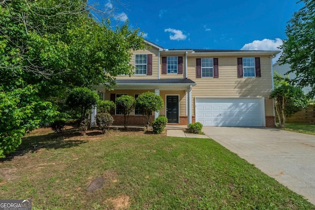 7250 Old Chapel, Atlanta, GA 30349 - view of front facade with an attached garage, driveway, brick siding, and a front lawn
