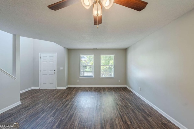 7250 Old Chapel, Atlanta, GA 30349 - unfurnished room with ceiling fan, dark wood-type flooring, and a textured ceiling