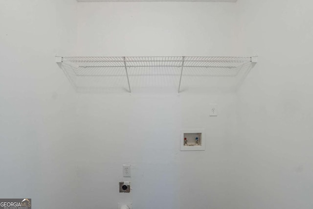 7250 Old Chapel, Atlanta, GA 30349 - laundry area featuring electric dryer hookup and washer hookup
