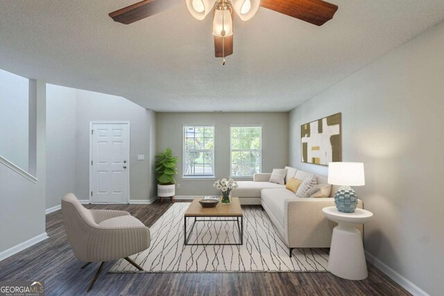 7250 Old Chapel, Atlanta, GA 30349 - living area featuring a ceiling fan, wood finished floors, and a textured ceiling