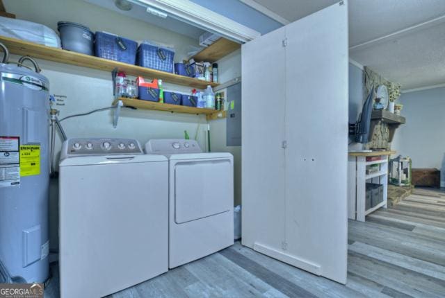 151 Padget Ln, Ellijay, GA 30540 - laundry area featuring electric water heater, washer and clothes dryer, wood finished floors, and electric panel