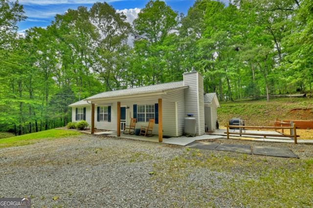151 Padget Ln, Ellijay, GA 30540 - single story home with a porch and a chimney