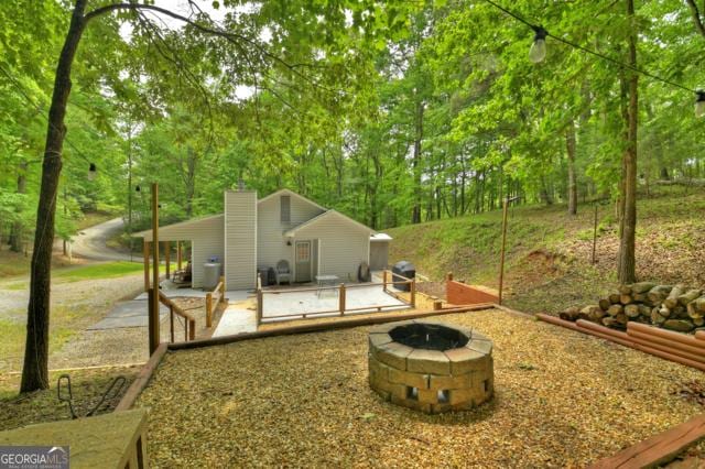 151 Padget Ln, Ellijay, GA 30540 - view of yard featuring an outdoor fire pit
