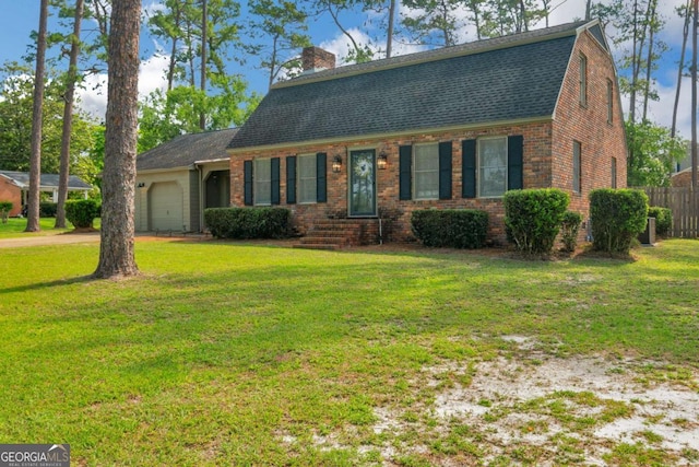 1504 Danora Dr, Waycross, GA 31501 - dutch colonial with brick siding, a garage, a chimney, and a shingled roof